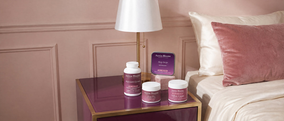 Peaceful Night Sleep Ritual: Magnesium Glycinate, Sleep Strips tin, Sleep Plus and Peaceful Night tallow cream on a bedside table by soft pillows