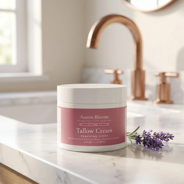 Tallow Cream Peaceful Night jar on marble bathroom vanity