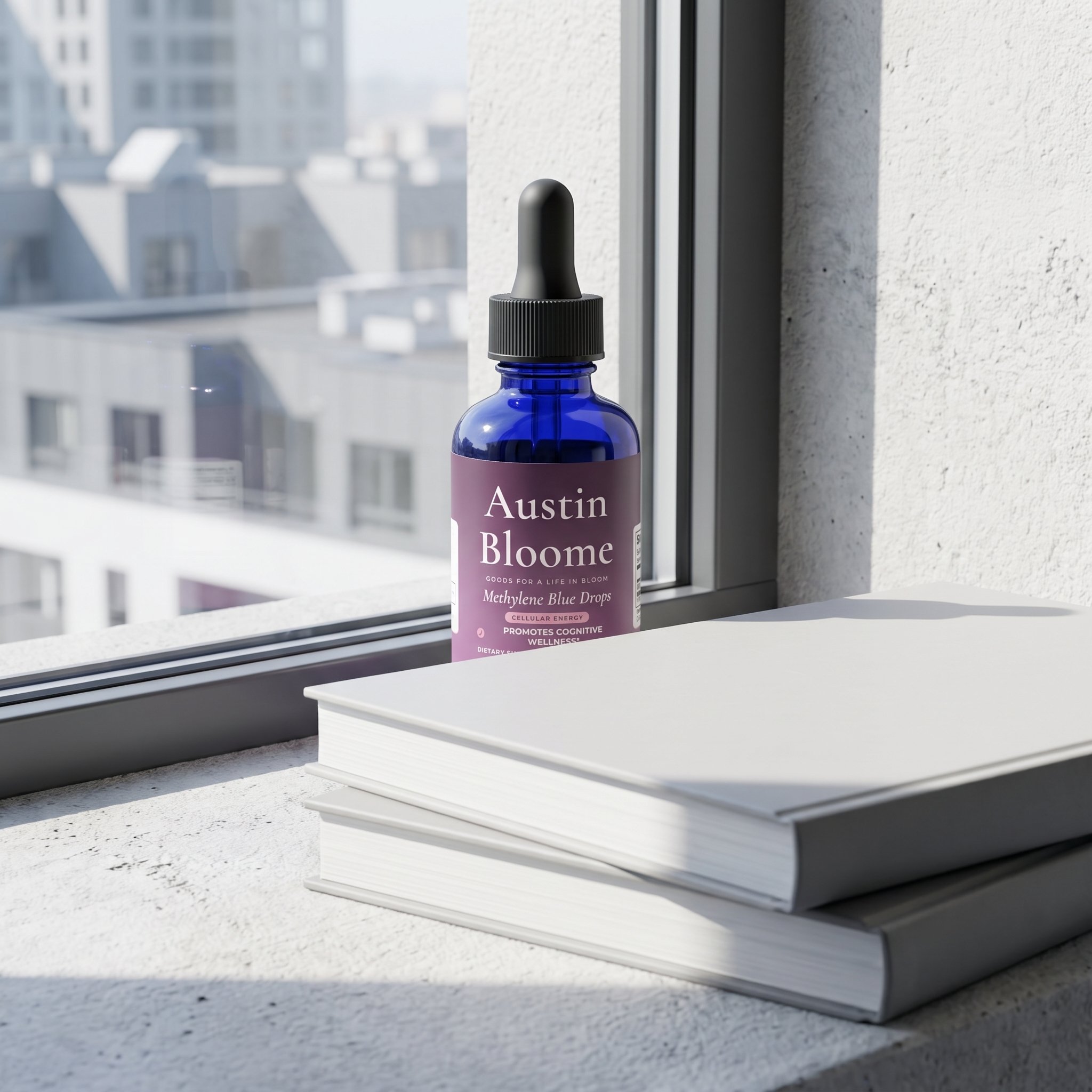 Methylene Blue Drops on a sunlit city window ledge with books