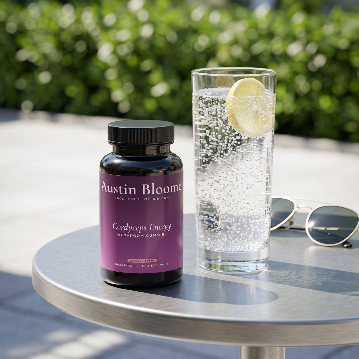 Cordyceps Energy Gummies on a sunny outdoor table with sparkling water