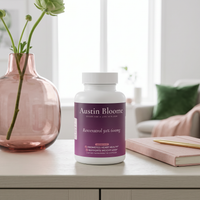 Resveratrol on a bright sideboard with a rose vase and notebook