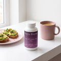 Omega-3 on a bright breakfast bar with avocado toast and coffee